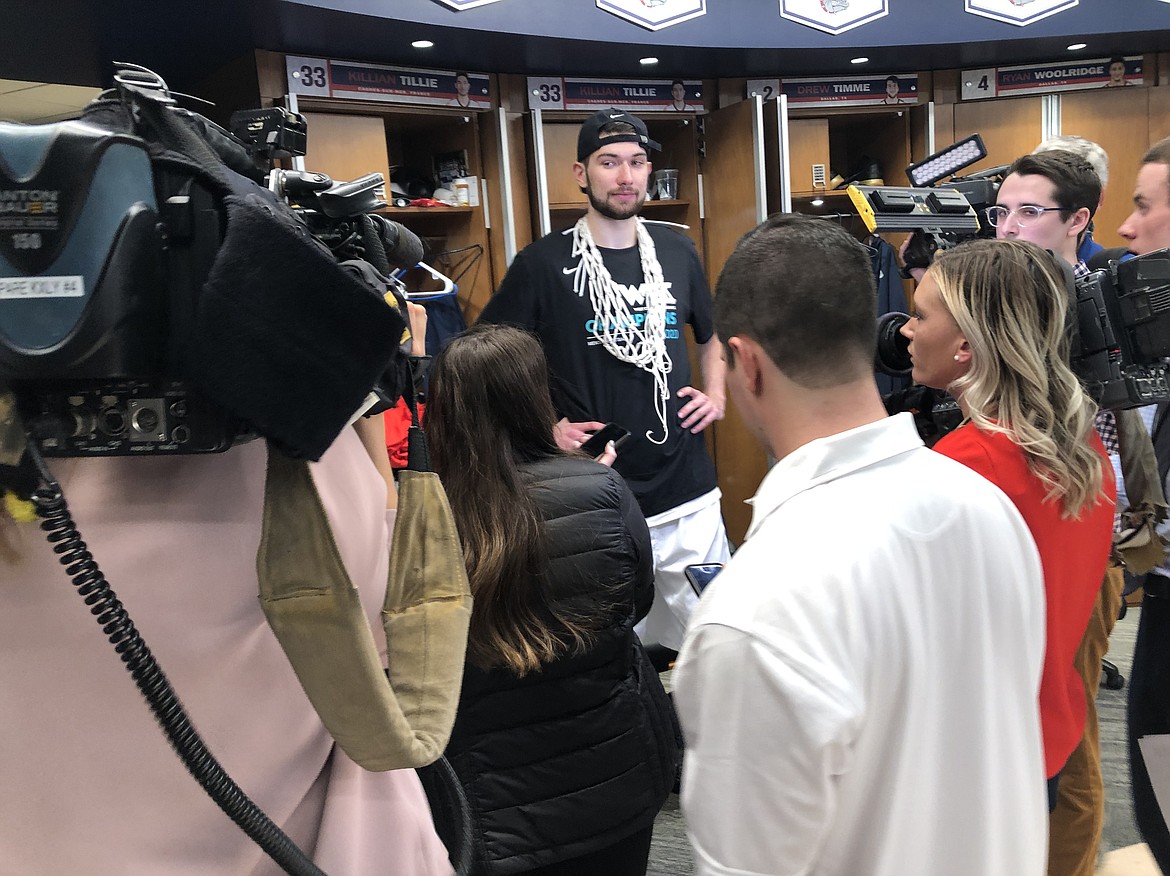 Killian Tillie holds court with the media after West Coast Conference regular-season champion Gonzaga defeated Saint Mary’s on Saturday at the McCarthey Athletic Center in Spokane.