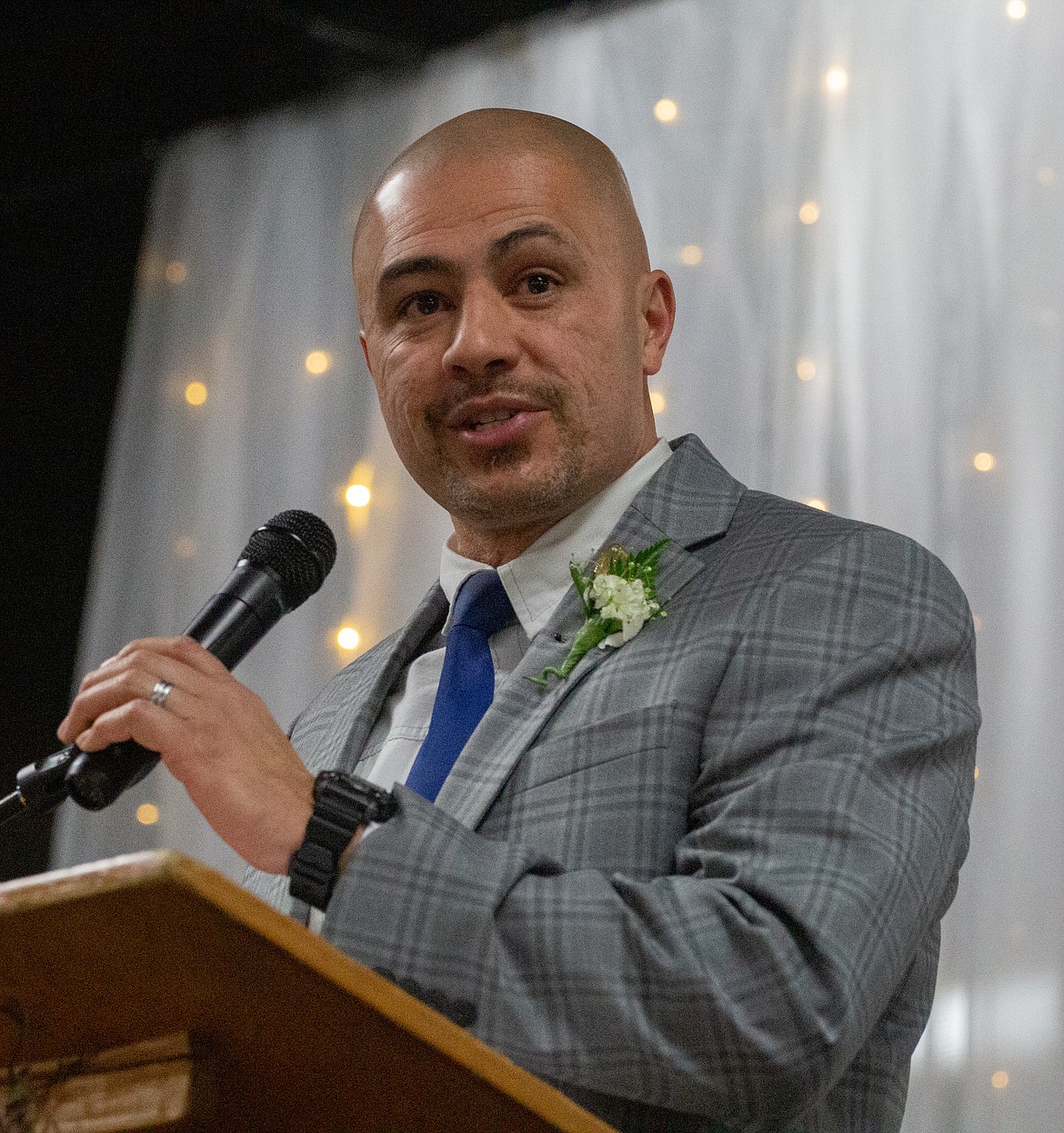 Casey McCarthy/The Sun Tribune Desert Oasis Principal Josh Tovar discussed his journey to being on the stage on Friday as he accepted his award for Teacher of the Year at the Othello Chamber of Commerce annual awards banquet.