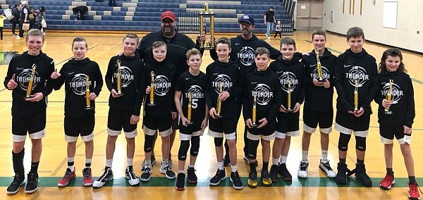 The River City sixth-grade boys AAU basketball team won the seventh-grade division in the Lake City Shootout on Feb. 14-16. They went 3-1 in pool play, dropping a game to the Moscow Gun Show. They came back and beat the Moscow Gun Show in the championship 48-47. In the front row from left are Jaxon Bowman, Jake Hill, Andy Evenson, Jace Taylor, Payton Winey, Wren Jackson, Seth Stevens, Will Jackson, Beau Pearson, Peyton Hillman and Seth Brooks; and back row from left, coaches Chris Pearson and Sean Taylor.