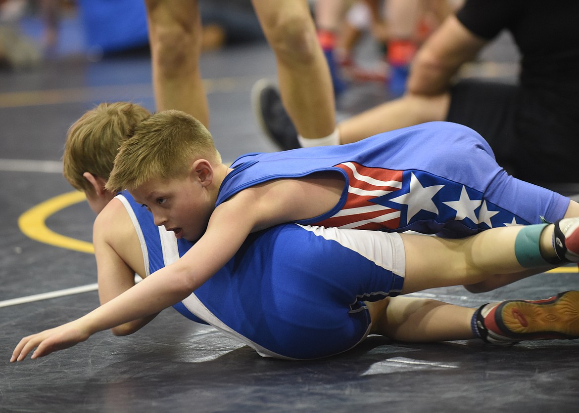 Superior’s Brody O’Neel battles Polson’s Korbyn Brumwell at the Mission Little Guy tournament last Saturday in St. Ignatius. (Scott Shindledecker/Mineral Independent)