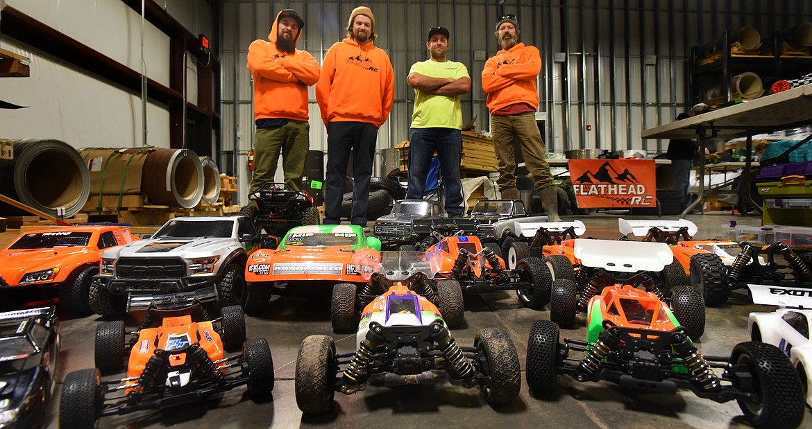 Flathead RC group founders, from left, Eric Pieffer, Angus Matheson, Brandon Hamburg and Cory Hutchison show off some of their racers at Glacier Steel Roofing Products Thursday, March 5. (Jeremy Weber photos/Daily Inter Lake)
