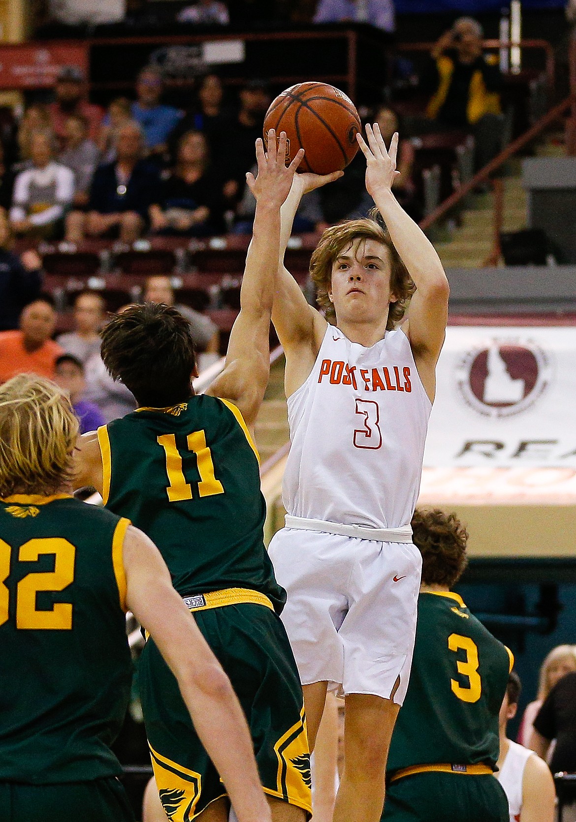 STEVE CONNER/Special to the Press 
 Post Falls guard Caden McLean shoots over the Borah defense during the state 5A boys basketball championship game at the Ford Idaho Center in Nampa.
