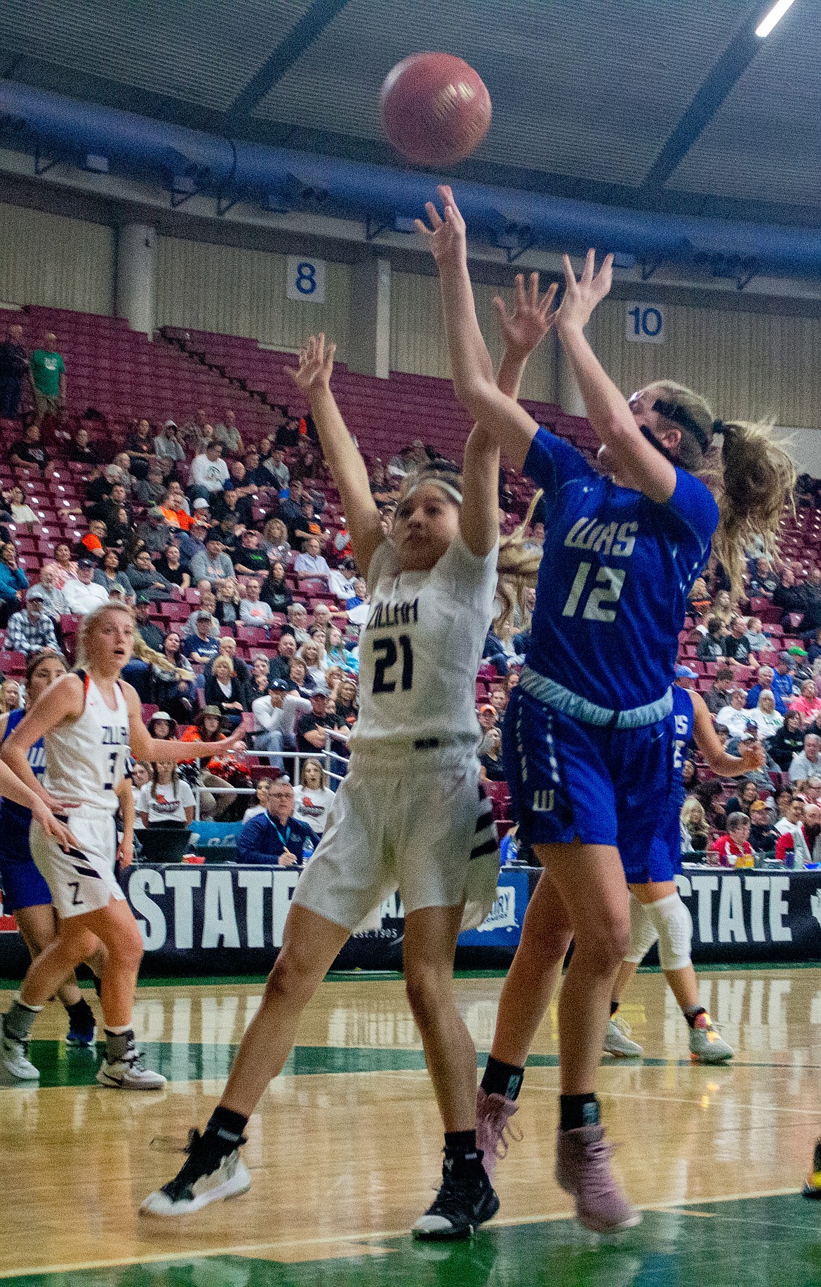 Casey McCarthy/Columbia Basin Herald Senior Brecka Erdmann turns to throw up the shot after driving into the lane against Zillah on Friday at the Yakima Valley SunDome.
