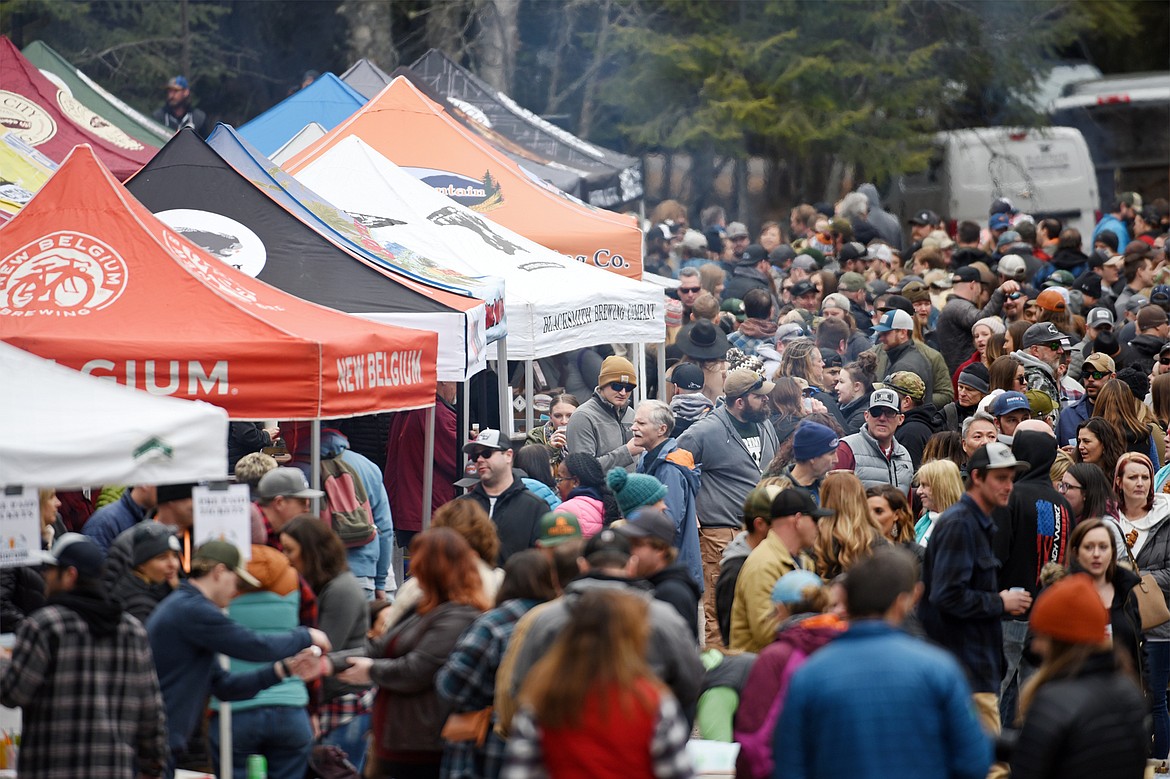 Attendees enjoy the Bigfork Brewfest at the Harry Horn Day Use Area of Wayfarers State Park on Saturday, March 7. (Casey Kreider/Daily Inter Lake)