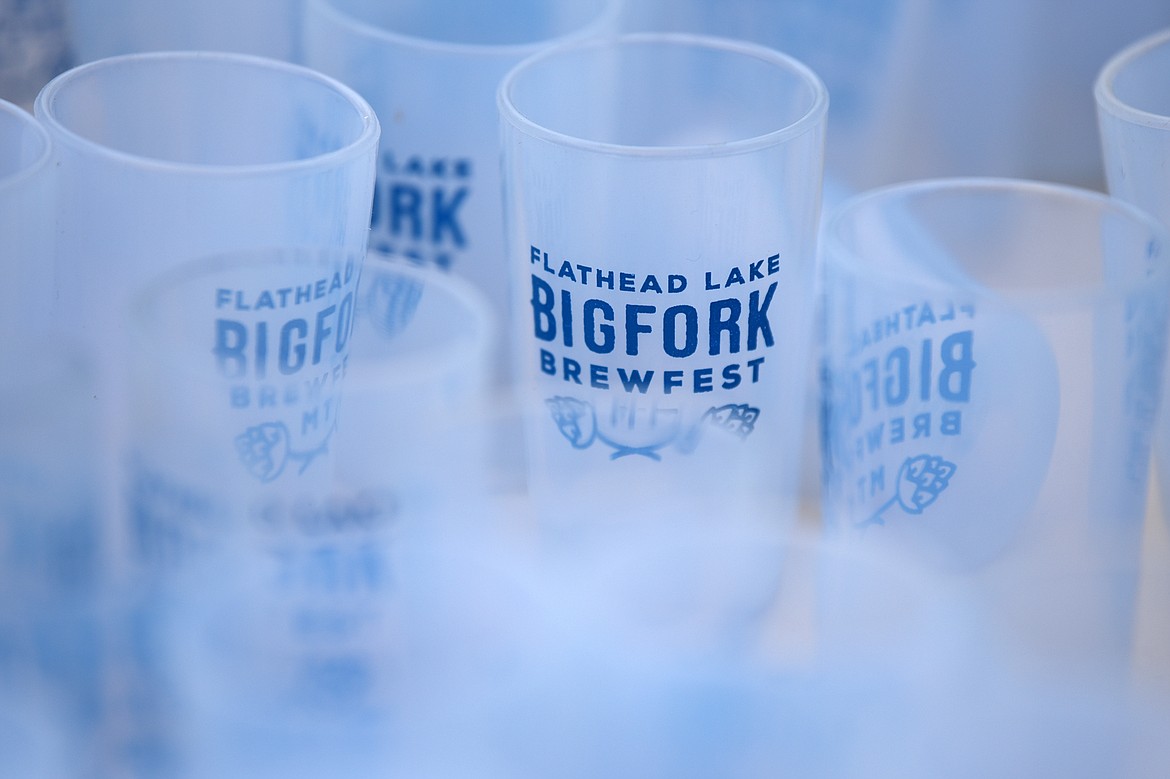 Cups to sample beers on a table at the entrance to the Bigfork Brewfest at the Harry Horn Day Use Area of Wayfarers State Park on Saturday, March 7. (Casey Kreider/Daily Inter Lake)