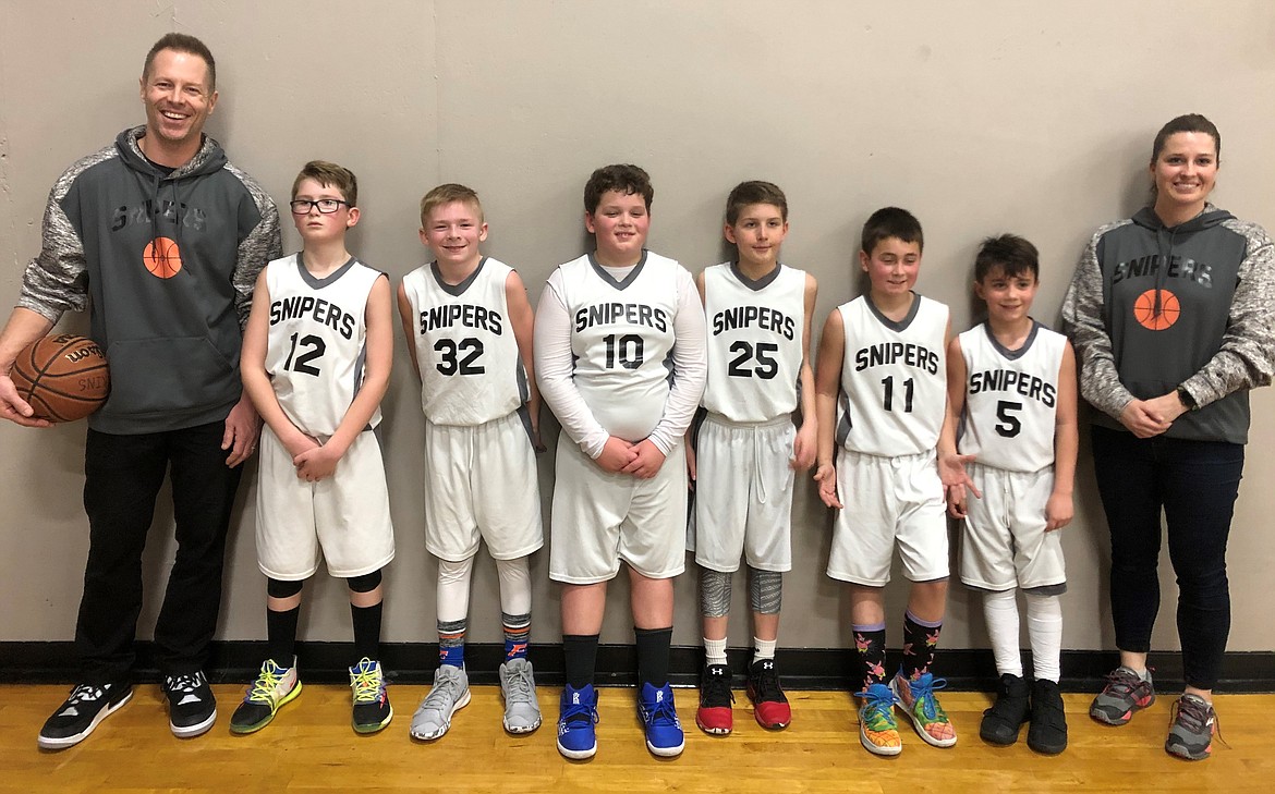 The Snipers from Coeur d’Alene went 3-1 for 3rd place at the Bring in Spring 2020 fourth-grade boys basketball tournament at The Warehouse in Spokane on March 7-8. From left are coach O’Jay Leveque, Gage Gatten, Landon Leveque, Brady Thompson, Noah Perkins, Cole Clyne, Tatum Frazier and coach Angie Gatten. Not pictured are Sam Priebe and Cache Gaby.