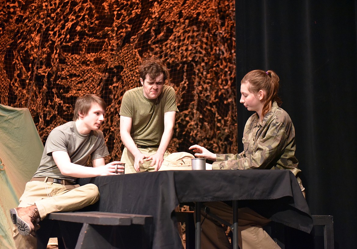 Nathan Sproul, Dashiell Schindler and Eden Scrafford discuss the state of the Army hospital unit during a rehearsal for “MASH” at the Whitefish Performing Arts Center. The Whitefish High School Drama Club brings the play to the stage on March 5, 6 and 7. (Heidi Desch/Whitefish Pilot)