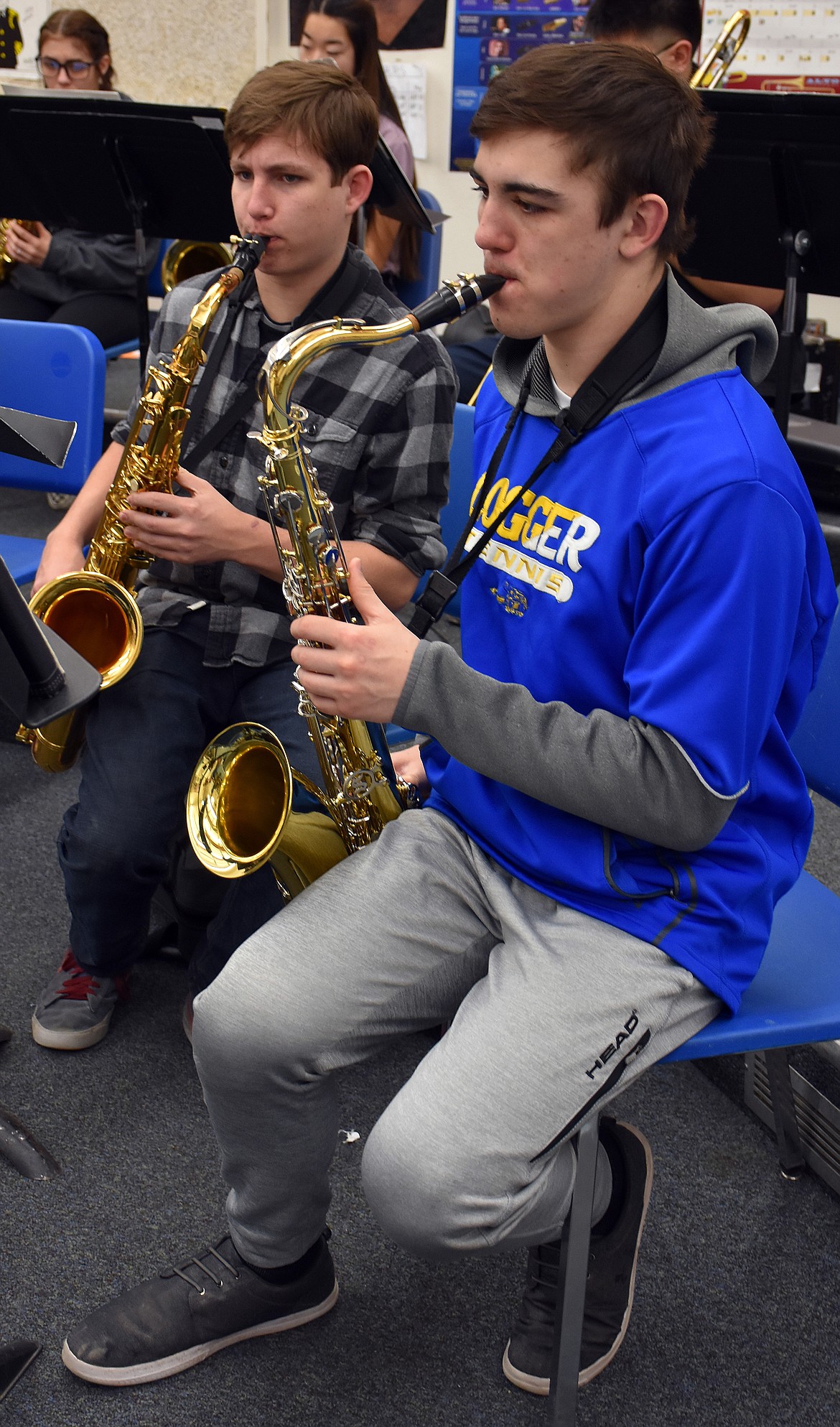 Ethan Morely, left, and Trey Thompson lead the high school band in rehearsel. (Duncan Adams/The Western News)