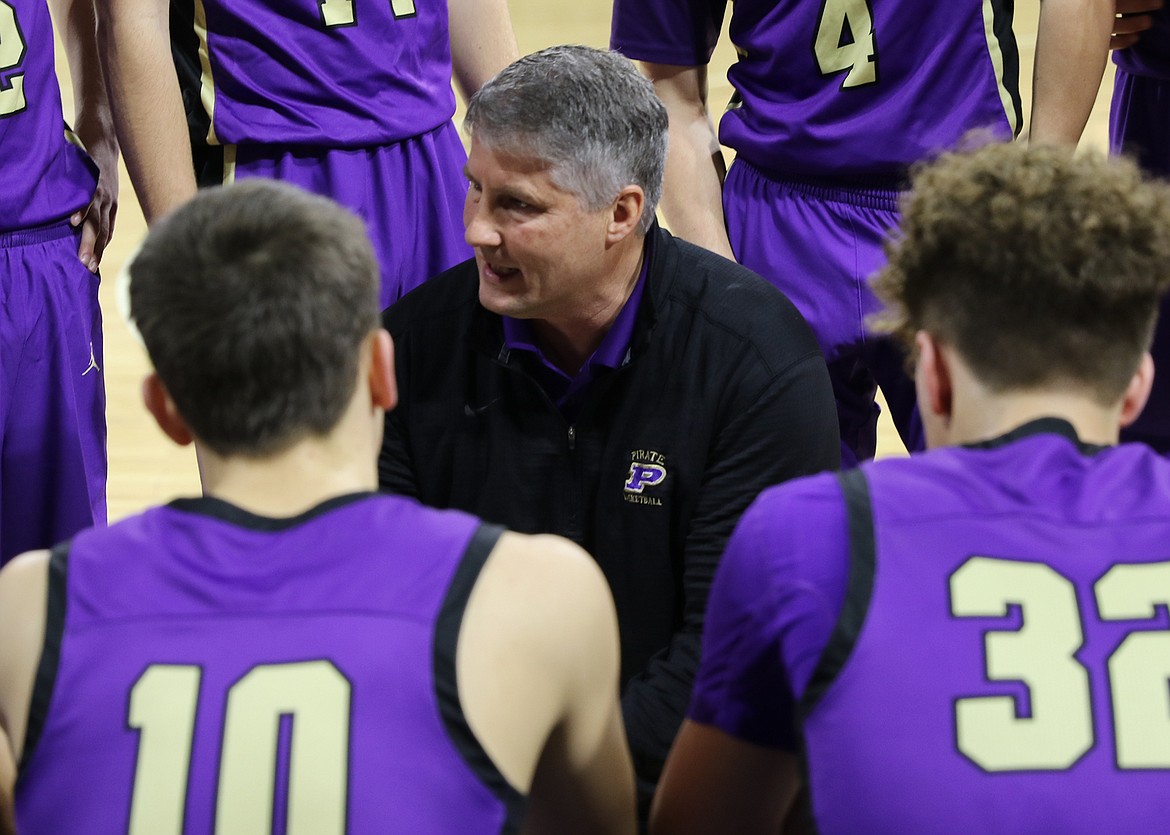 Polson coach Randy Kelley goes over strategy in the fourth quarter of a loser-out game against Frenchtown at the State A tournament at Billings Skyview High School on Friday. (Bob Gunderson/Lake County Leader)