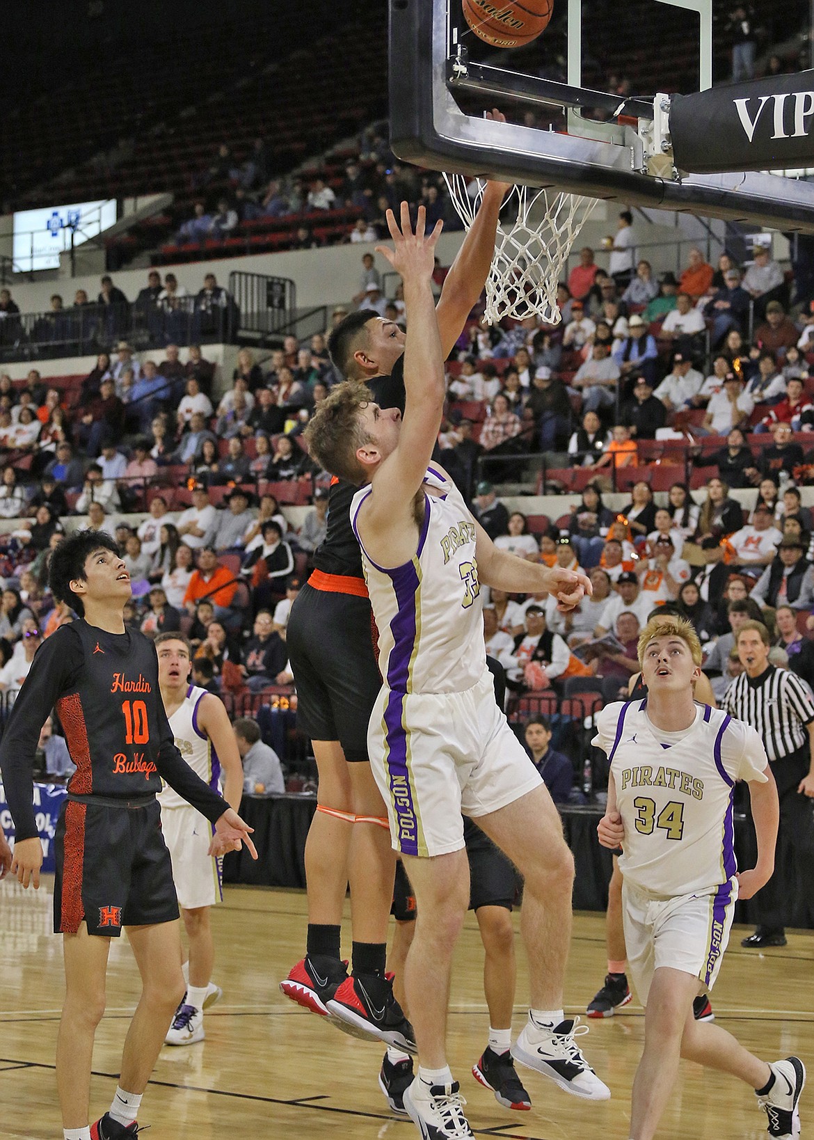 Polson Pirate Braunson Henriksen had scored 11 points in the opening round loss to Hardin at the State A Tournament in Billings Thursday morning. (Bob Gunderson photo)