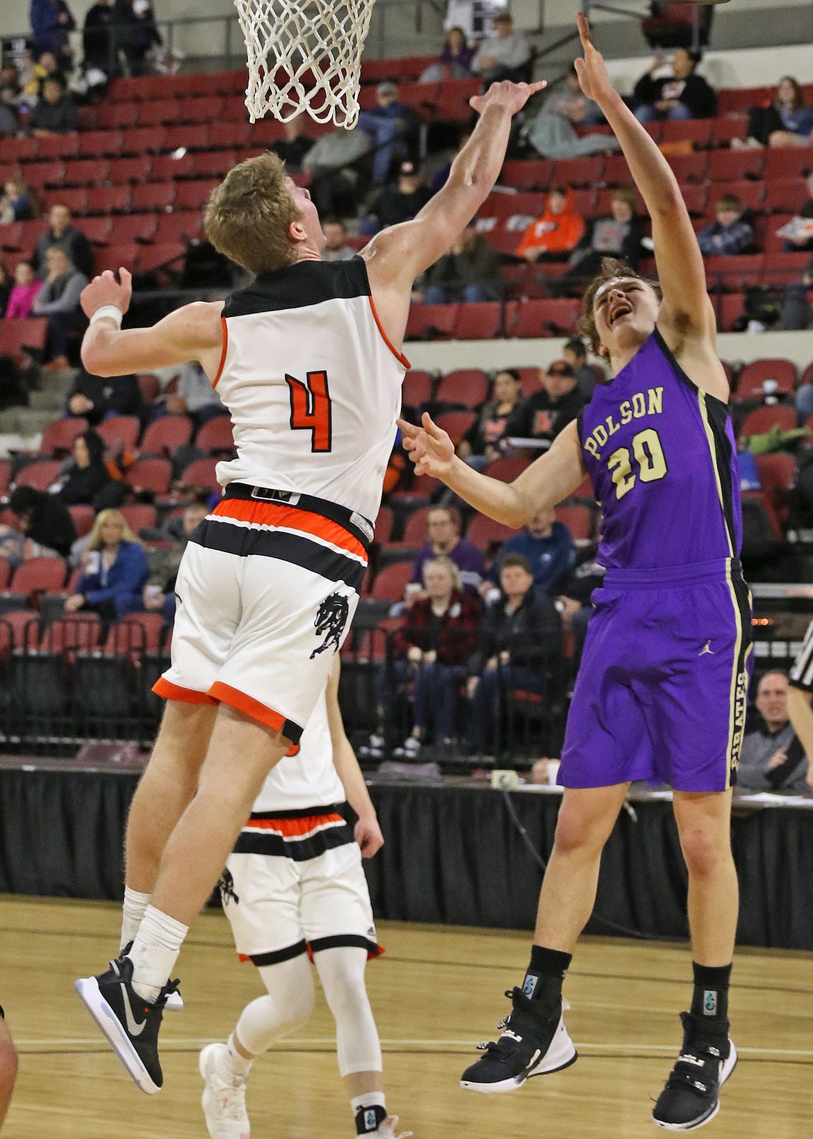 Polson freshman Jarrett Wilson lays in 2 of his 6 points against Frenchtown Friday afternoon at the State A tourney in Billings. (Bob Gunderson photo)