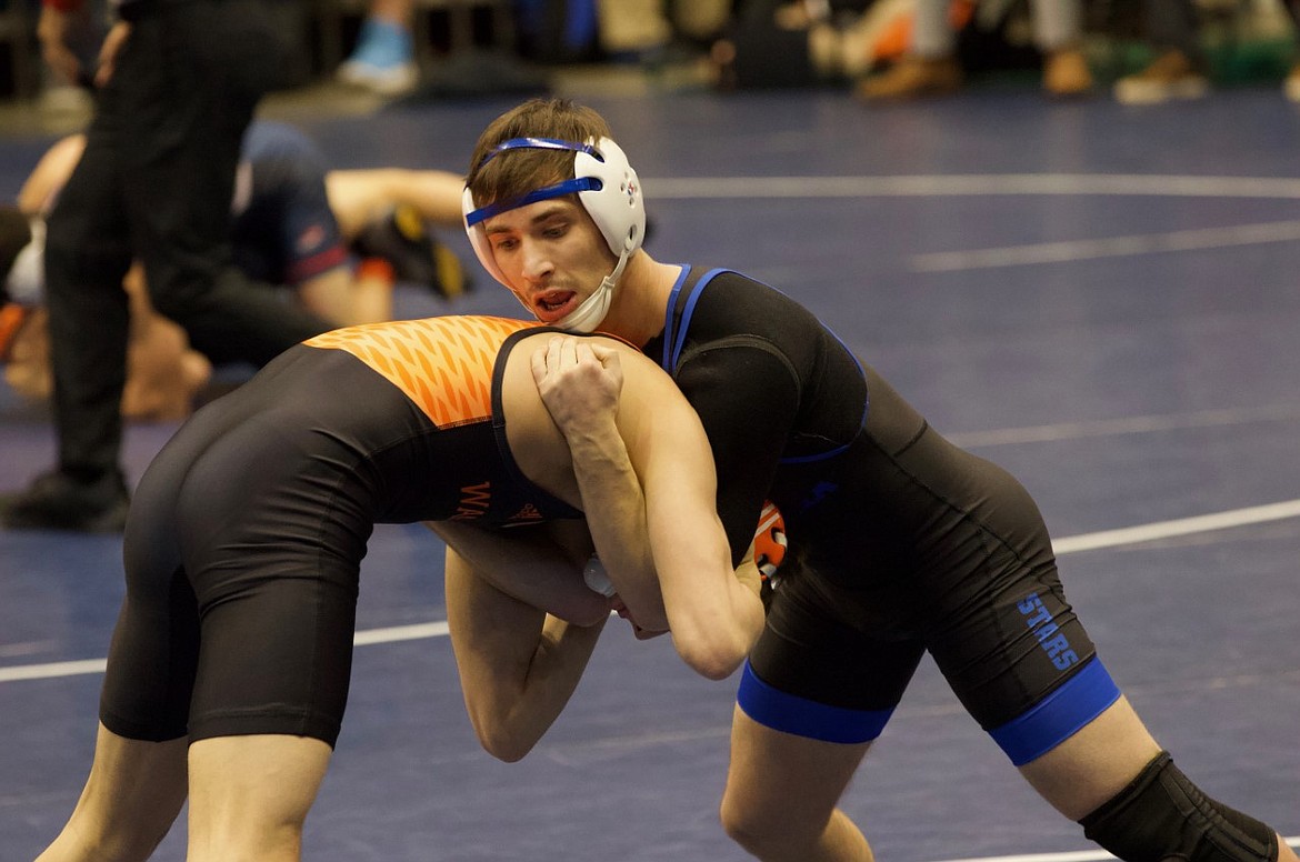 Drake Foster, an Oklahoma City University wrestler and a 2015 graduate of Post Falls High, attempts to take down an opponent during a 2019 match. Foster finished fourth at 133 pounds at the NAIA Championships on March 7 in Park City, Kan.