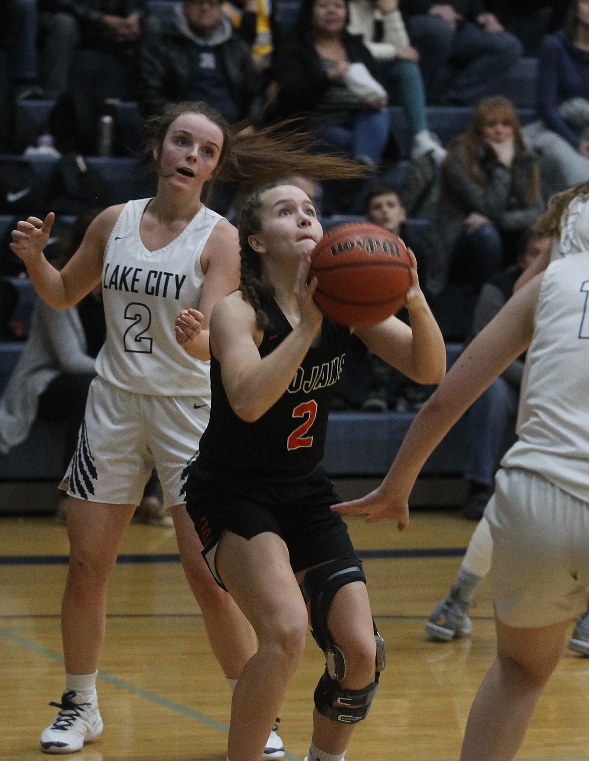 Post Falls sophomore guard Lexie Heath puts up a jumper in the first half of the 5A Region 1 girls basketball second-place game on Feb. 15 at Lake City High.