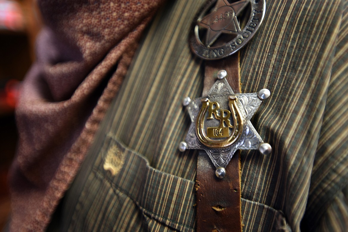 Richard Cheney shows off his badge as one of the earlier members of Double R Bar Regulators shooters club in California. (Jeremy Weber/Bigfork Eagle)