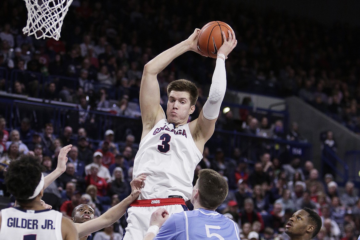 YOUNG KWAK/Associated Press 
 Filip Petrusev went through the NBA evaluation process after last year, his freshman season. If he opts for the NBA draft this season, he's projected as a late second-rounder.