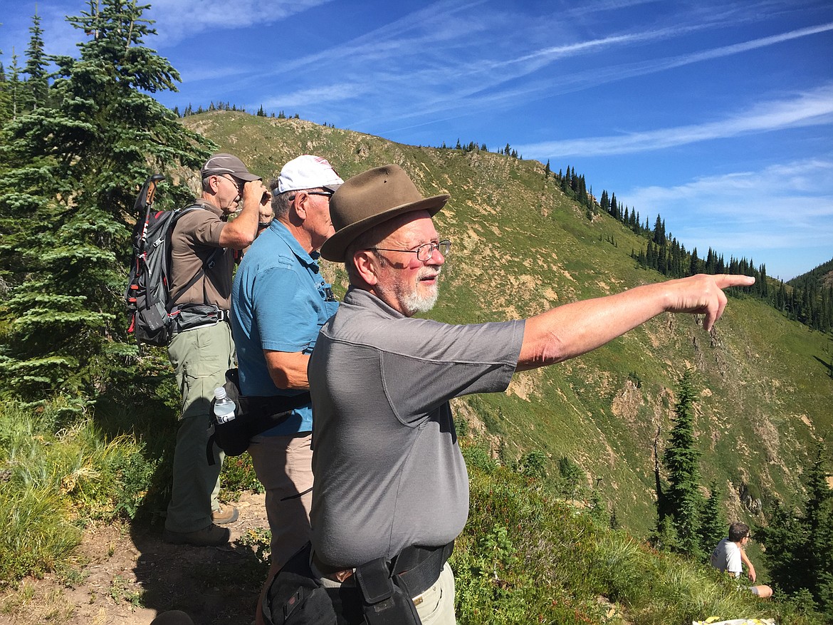 Tom Castles uses his lifetime of experience in the mountains of Mineral County to explain the views from the Stateline Trail near Illinois Peak south of Superior. (Photo courtesy Bert Lindler)