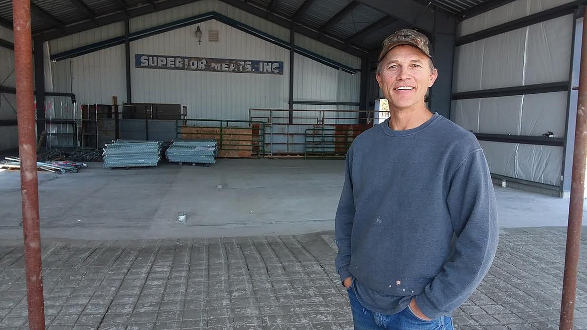 Jerry Stroot, owner of Superior Meats, stands in front of the expansion to his current building. The larger space will allow him to better serve his customers in Western Montana. (Monte Turner/Mineral Independent)