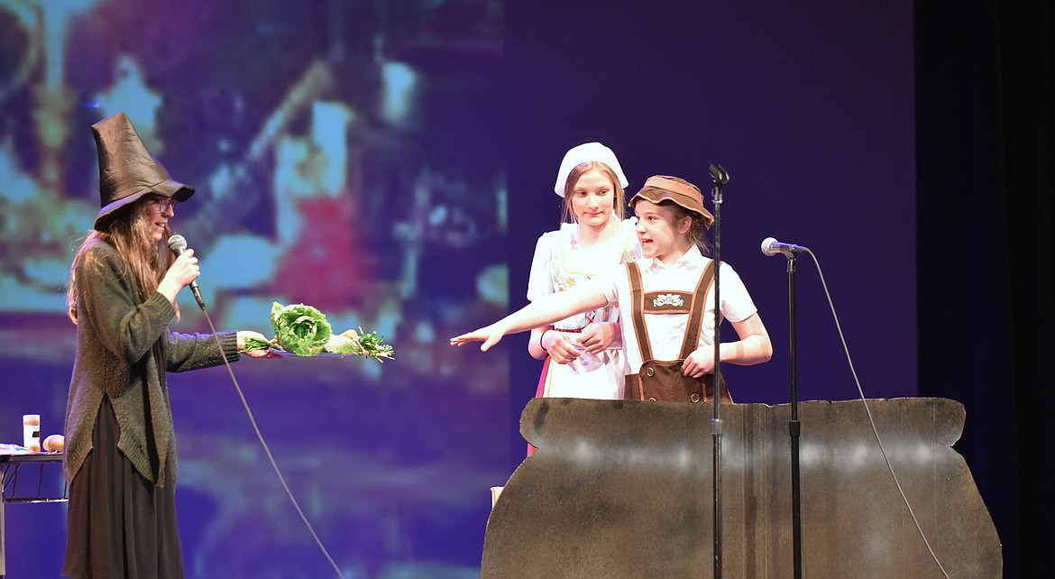 Lillian Nelson, Avery Theis and Katie Flowers perform the “True Story of Hansel and Gretel” during the Whitefish Middle School talent show earlier this month at the Whitefish Performing Arts Center. (Heidi Desch/Whitefish Pilot)