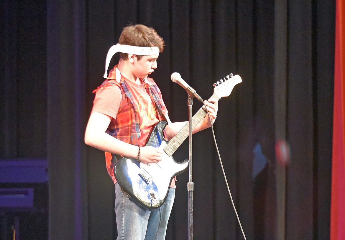 Taren Horner plays a Metallica song during the Whitefish Middle School talent show earlier this month at the Whitefish Performing Arts Center. (Heidi Desch/Whitefish Pilot)