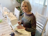 Volunteers making gowns for hospital
