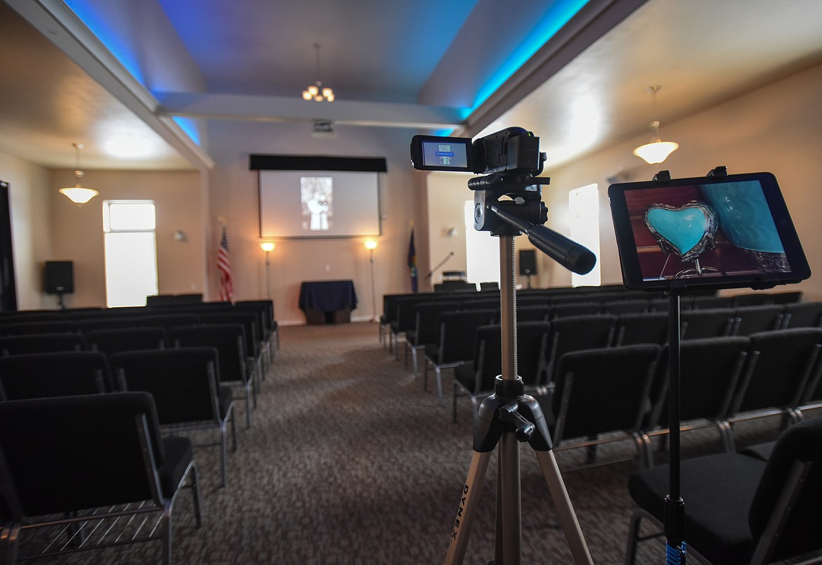 A video camera, iPad and projection screen used to record and stream funeral services, present videos and project images at Darlington Cremation and Burial Service on Wednesday, April 1. (Casey Kreider/Daily Inter Lake)