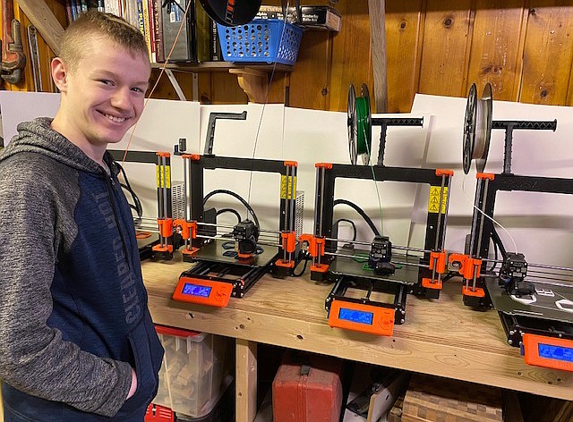 Trevor Seals, a sophomore at Glacier High School, is using four of the school’s 3D printers to make N95 masks for Kalispell Regional Medical Center. (Courtesy Lincoln Seals)