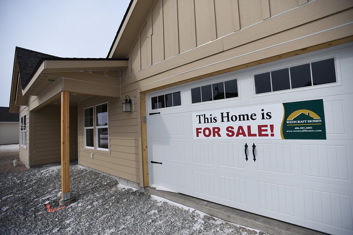 A home is advertised for sale along Swede Trail in the Silverbrook Estates development north of Kalispell on Wednesday, April 1. (Casey Kreider/Daily Inter Lake)