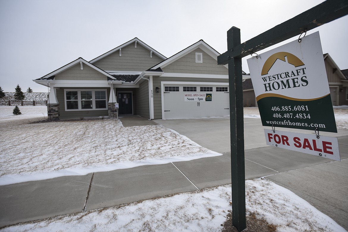 A home is advertised for sale along Silver Tip Trail in the Silverbrook Estates development north of Kalispell on Wednesday, April 1. (Casey Kreider/Daily Inter Lake)
