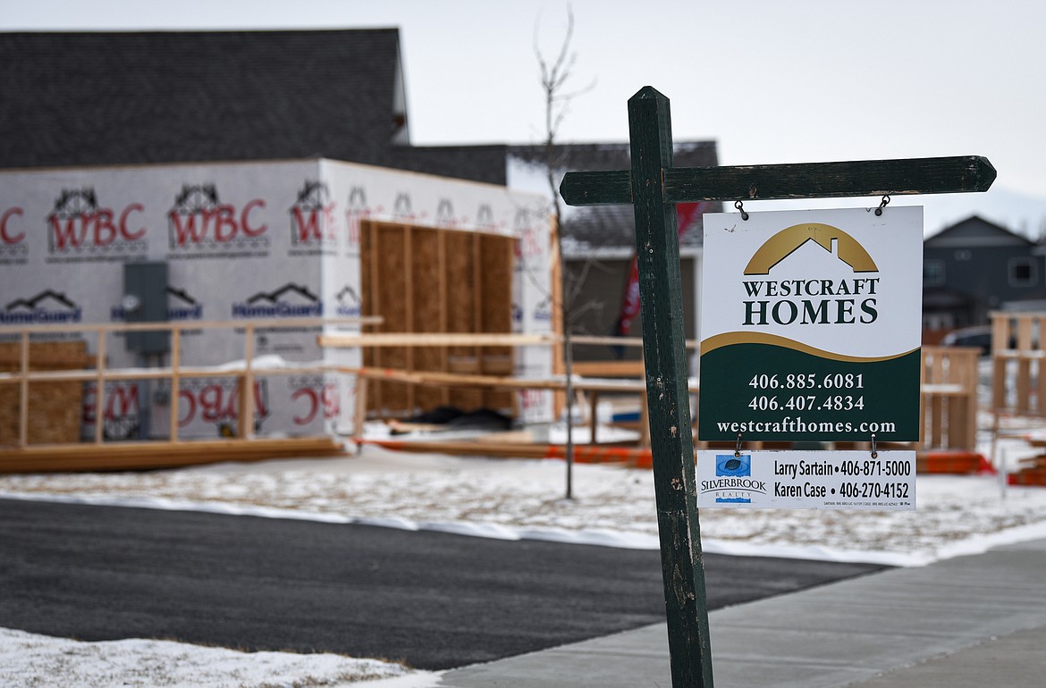 A hOUSE under construction the Silverbrook Estates development north of Kalispell.  Realtors are concerned that the COVID-19 virus will delay work on current building projects.