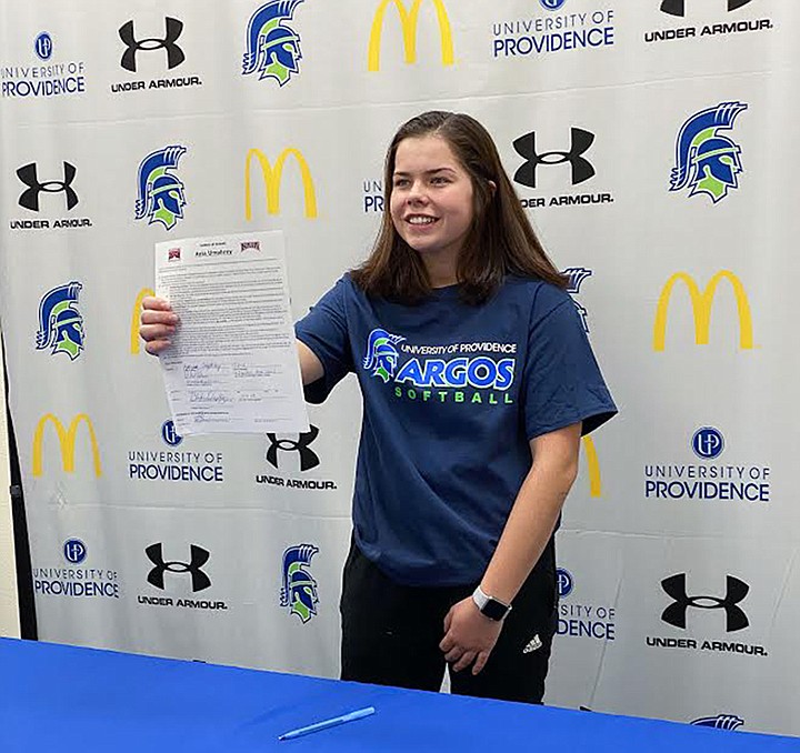 Azia Umphrey celebrates signing with the University of Providence Argonauts to play college softball. (Photo courtesy Christa Umphrey)