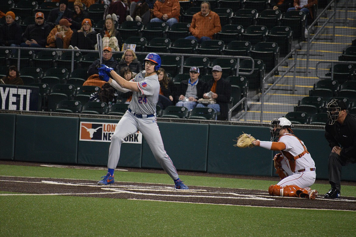 Photo courtesy of BOISE STATE ATHLETICS 
 Michael Hicks, a 2015 graduate of Coeur d'Alene High, watches a ball go down the third base line during a game against Texas on Feb. 21 in Austin. Hicks, who started his college career at Yavapai, had his redshirt senior year cut short due to the coronavirus pandemic.