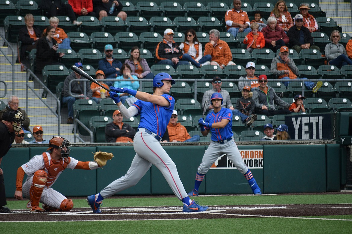 Michael Hicks, a 2015 graduate of Coeur d’Alene High, swings at a pitch during a game against Texas on Feb. 22 in Austin, Texas. Hicks, who started his college career at Yavapai, had his redshirt senior year cut short due to the coronavirus pandemic.