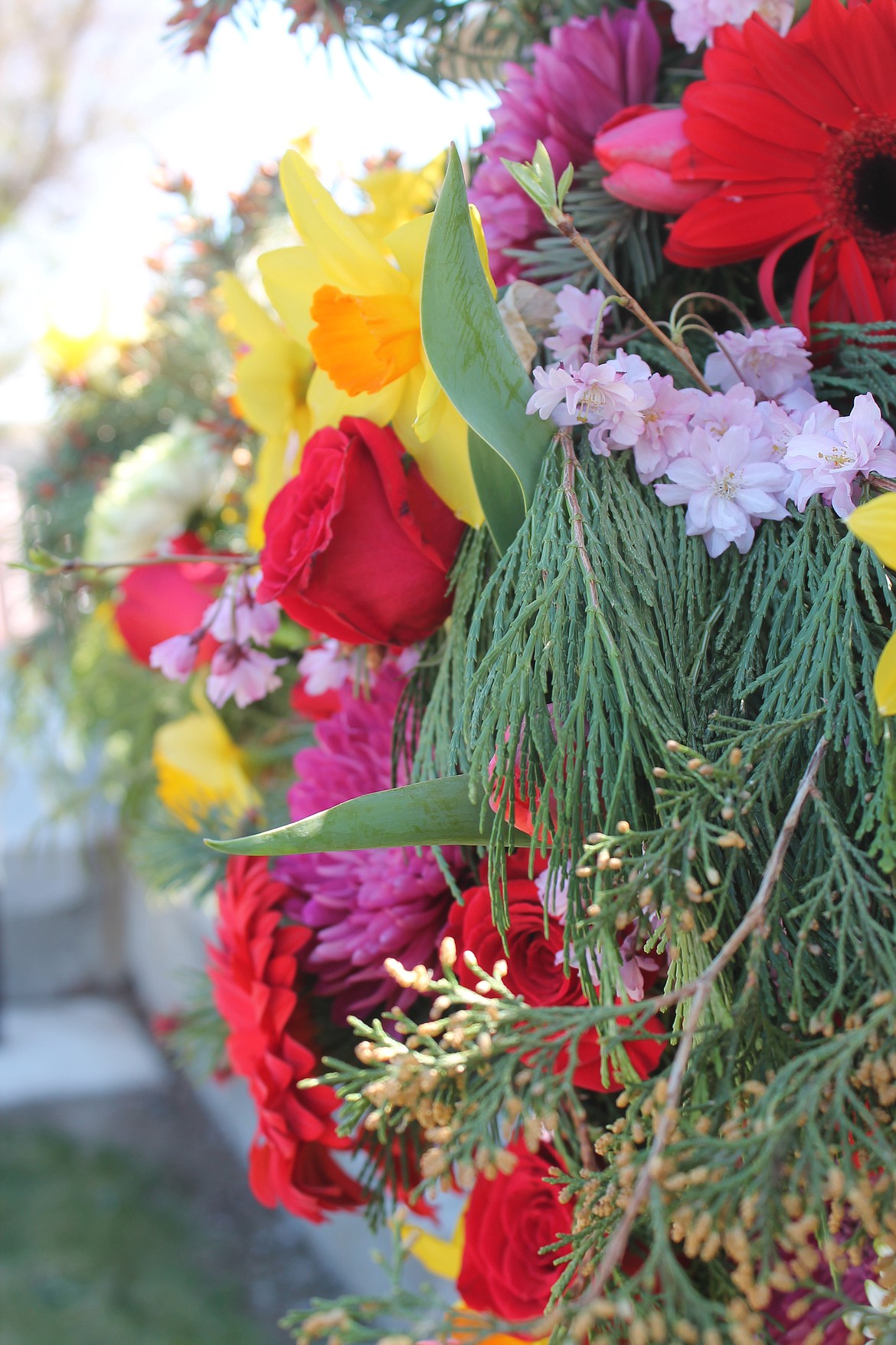 Roses, daffodils and other blossoms adorn the flower cross at Immanuel Lutheran Church on Easter Sunday.