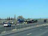 Semi rolls two miles east of Moses Lake Monday morning
