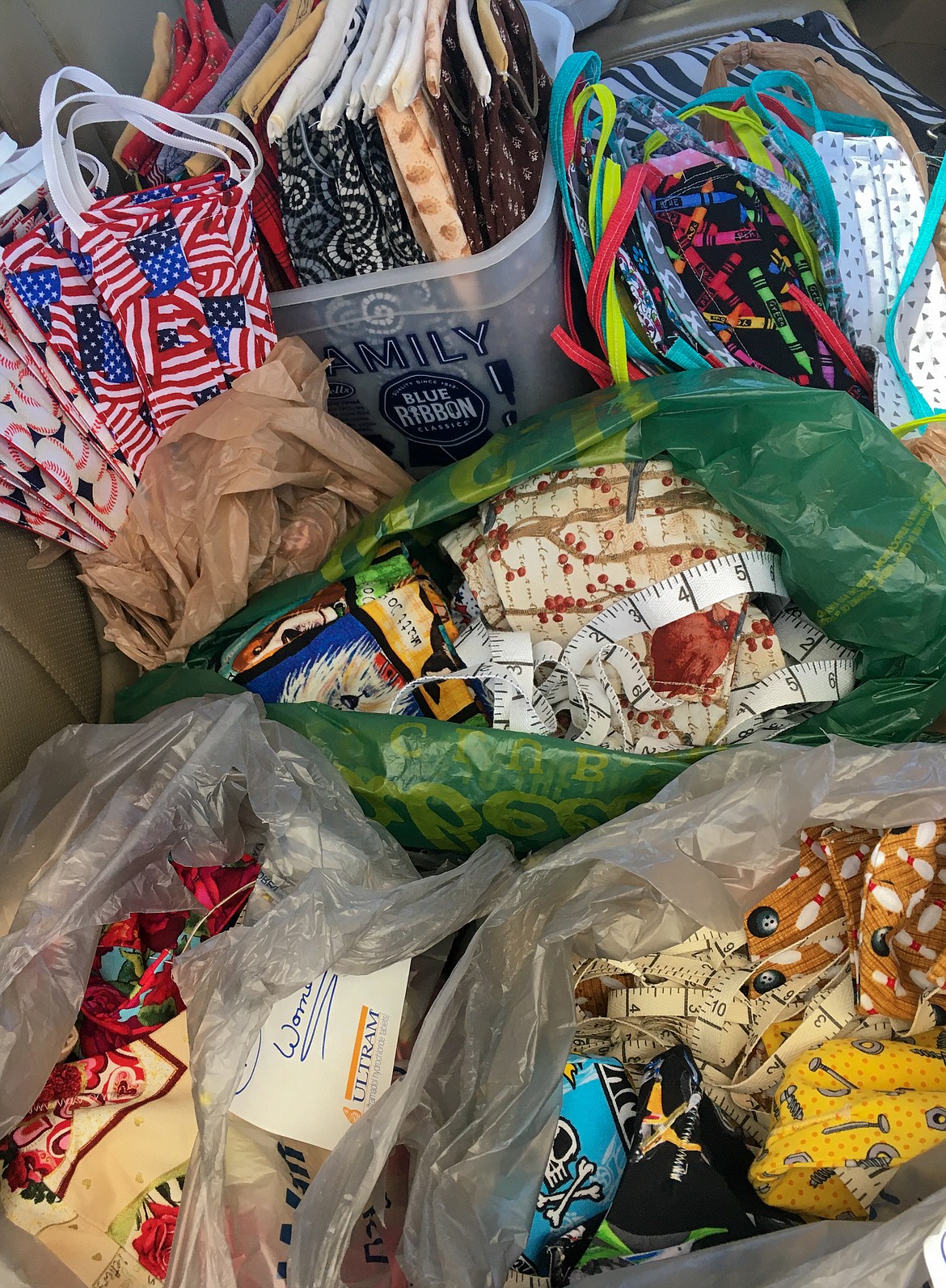 Courtesy photo 
 Bags overflow with masks made by the Face Mask Army of Othello to be delivered to businesses and responders in need.