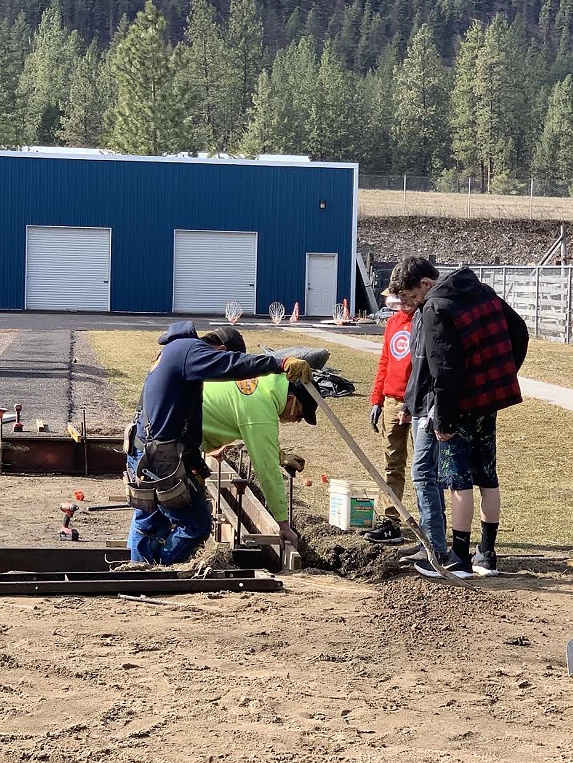 Work crews build footers as they create new jumping pits at Superior School. (Courtesy photos Byron Quinlan)