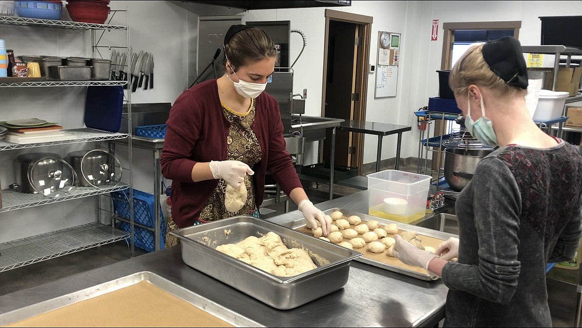 Volunteers with the Boys and Girls Club help prepare meals that are distributed across the valley during the school closure. (Boys and Girls Club photo)