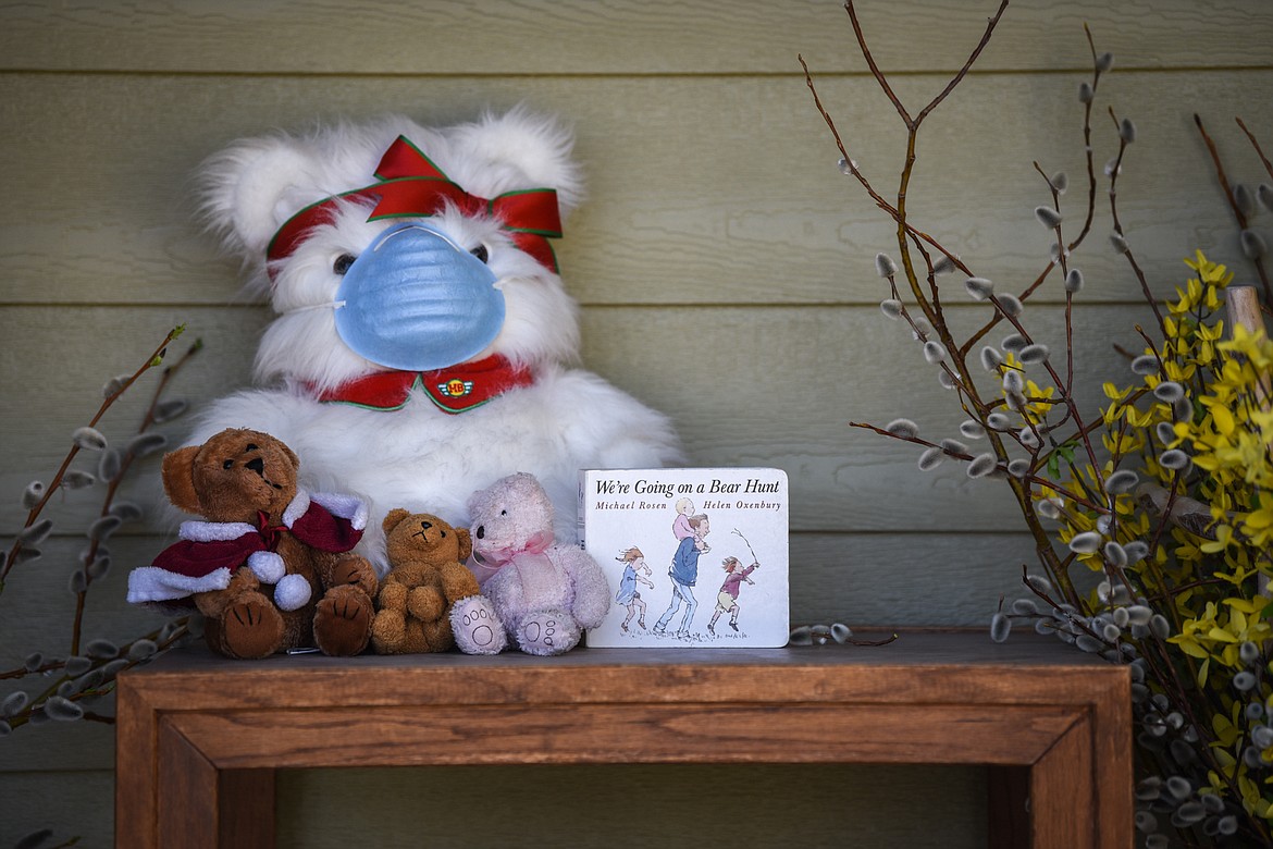 Stuffed animals and a copy of “We’re Going on a Bear Hunt” on Pat Freebury’s front porch on Tuesday, April 21. (Casey Kreider/Daily Inter Lake)