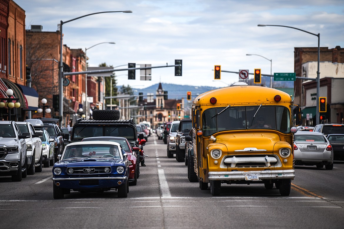 Vehicles stop at a traffic light on Main Street during the Kruise Kalispell event on Friday, April 17. (Casey Kreider/Daily Inter Lake)
