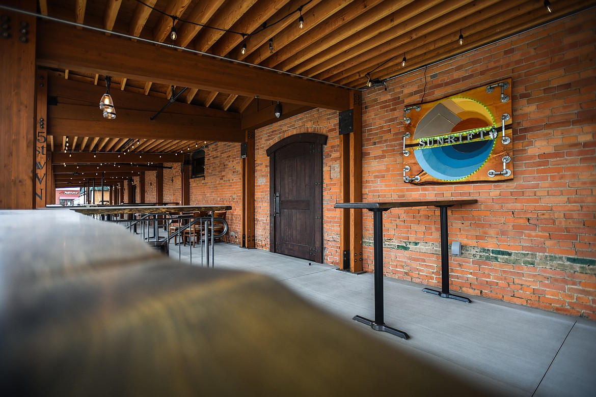An outdoor seating area is shown outside the restaurant at SunRift Beer Company in Kalispell on Thursday, April 23. (Casey Kreider/Daily Inter Lake)