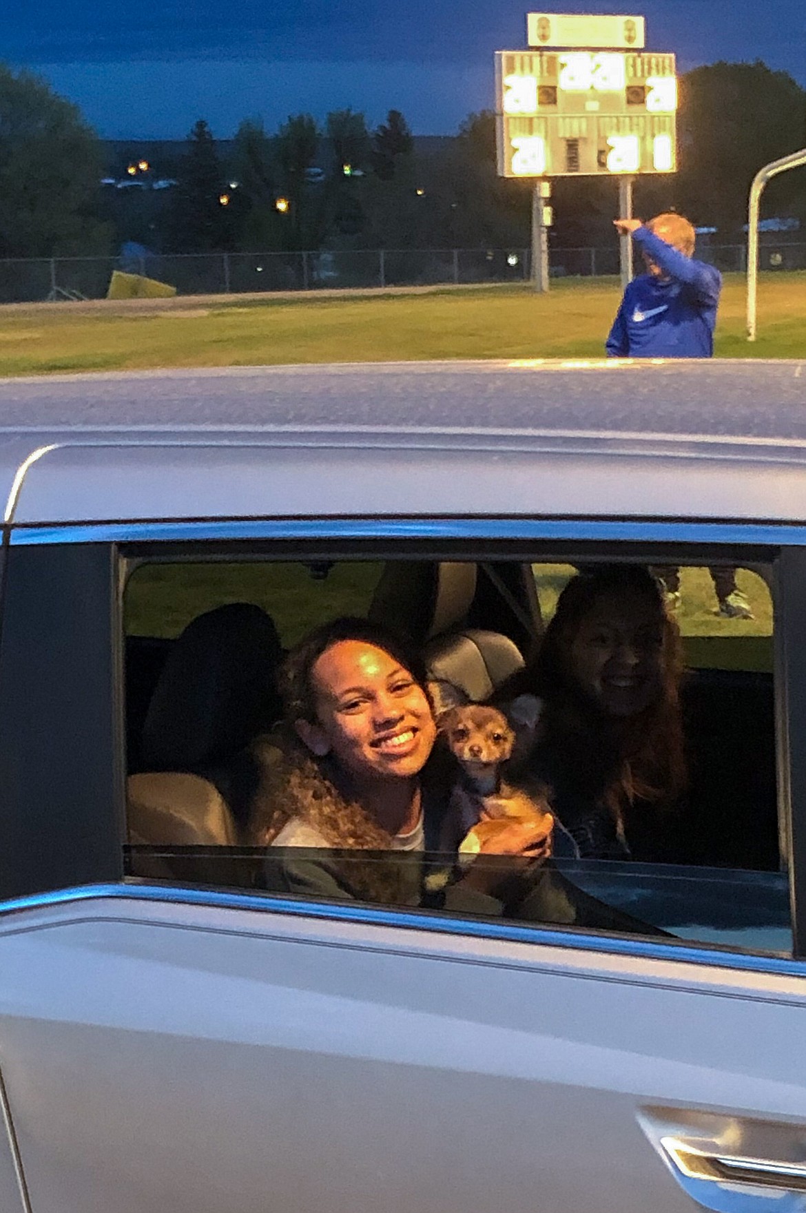 Courtesy photo
Soap Lake senior Sierra Janikowski smiles as she makes her way around the track at Soap Lake High School on Friday night as part of the Be the Light campaign looking to honor the 2020 senior class.