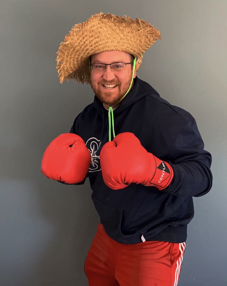 Andy Harris dressed up in boxing gloves and straw hat to catch the attention of his students. Harris and the other four Quincy School District elementary PE teachers are making videos to keep their students interested in staying active.
