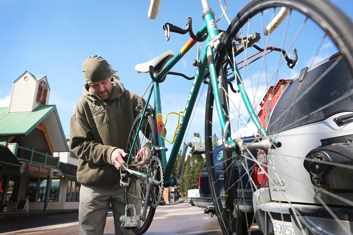 Tom Gibson completes a tune-up on a 1980s Peugeot road bike in downtown Bigfork on Thursday, April 23. (Mackenzie Reiss/Bigfork Eagle)