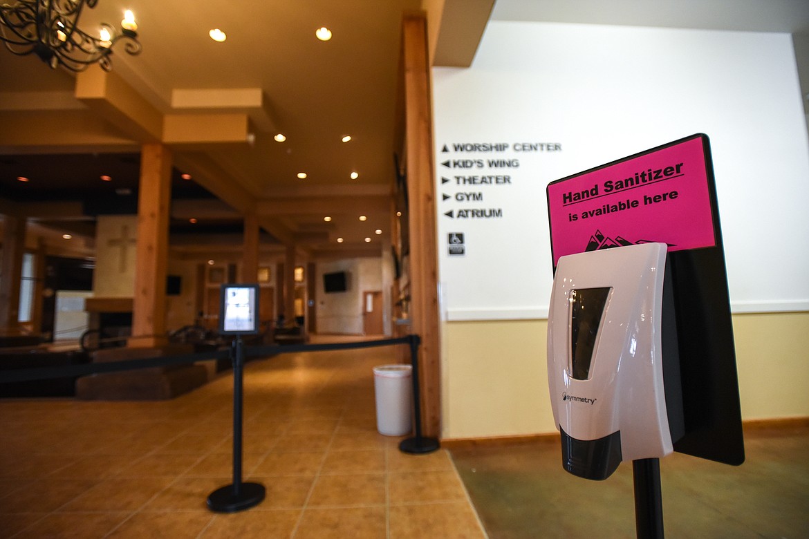 Hand sanitizing stations are set up along a queue congregants will follow into the sanctuary at Easthaven Baptist Church in Kalispell on Thursday, April 30. (Casey Kreider/Daily Inter Lake)