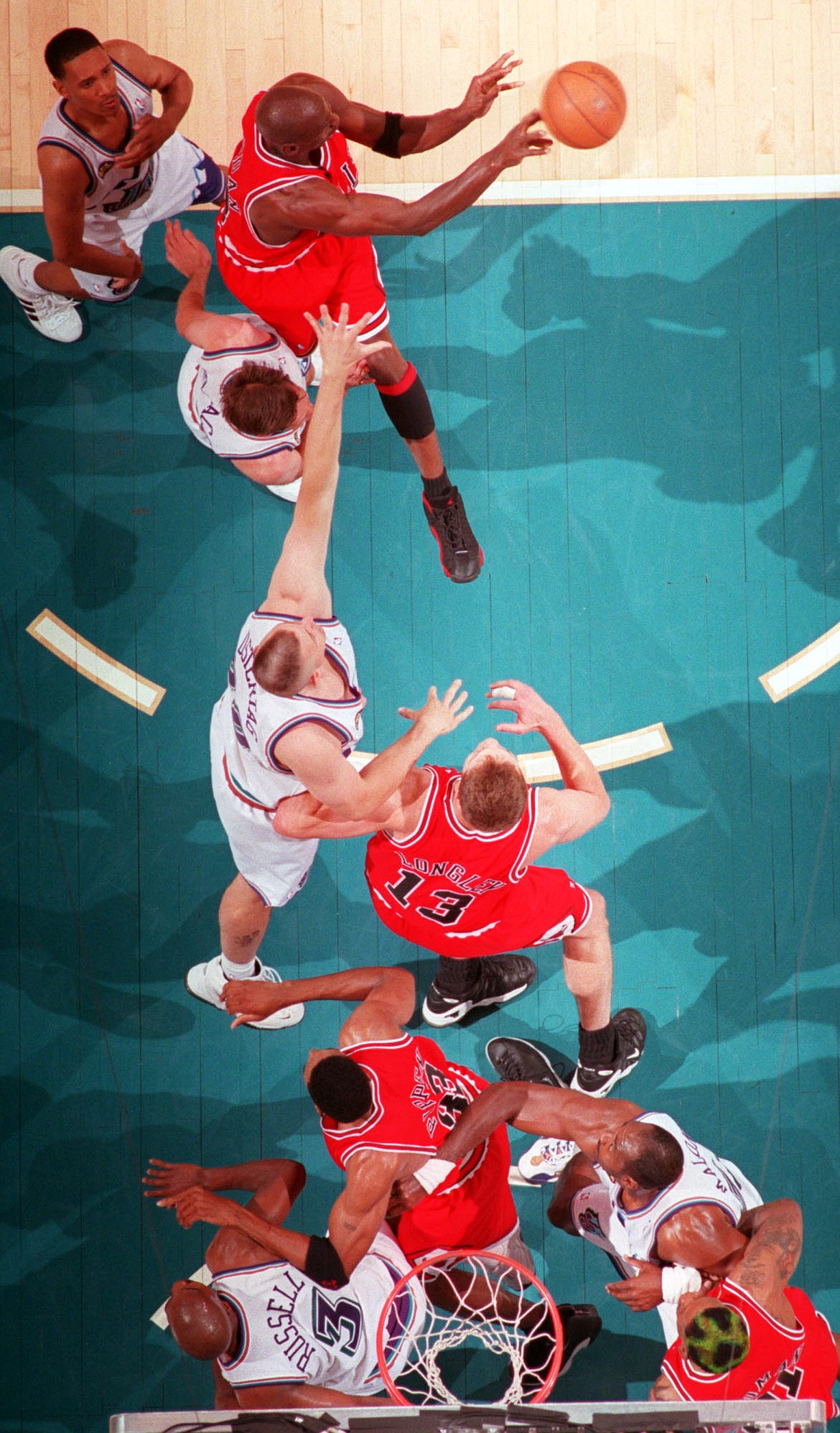 MARK J. TERRILL/Associated Press file 
 Michael Jordan of the Chicago Bulls passes to a teammate in Game 1 of the 1998 NBA Finals against the Utah Jazz in Salt Lake City.