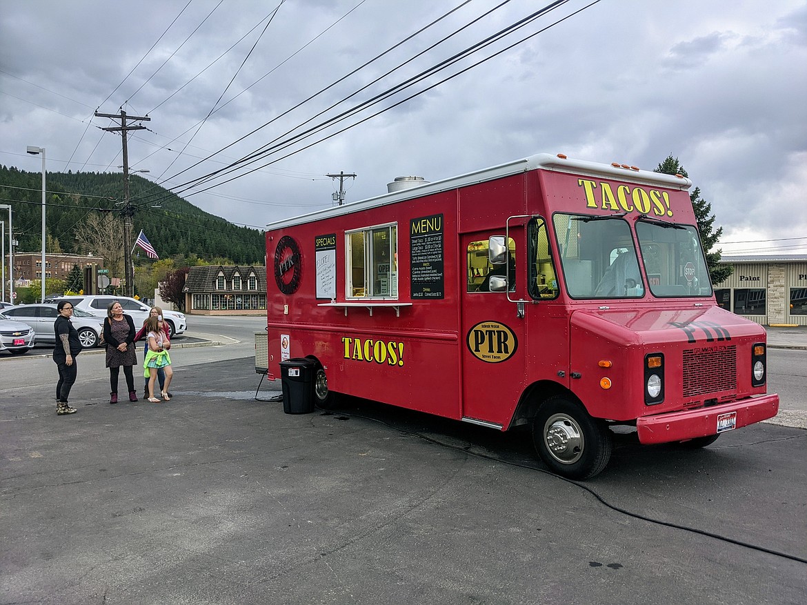 Photo by CHANSE WATSON 
 Hungry customers wait for their food at Pablo’s Taco Truck Revolution last Saturday during a soft opening. Delgado plans on having rotating specials, so customers should check out their Facebook page for updates.