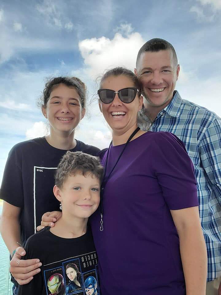 Flathead High School graduate and nurse Megan Moore (center right) has been away from her husband Justin and children Lily (15) and Jackson (8) as she helps in the battle against COVID-19. (Photo provided)