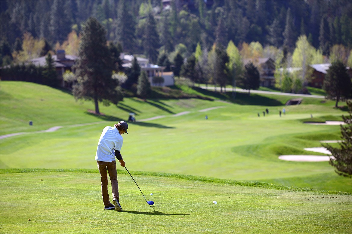 Bigfork's Asher VanCampen tees off on the 13th hole at Eagle Bend Golf Club on Tuesday. (Casey Kreider/Daily Inter Lake)