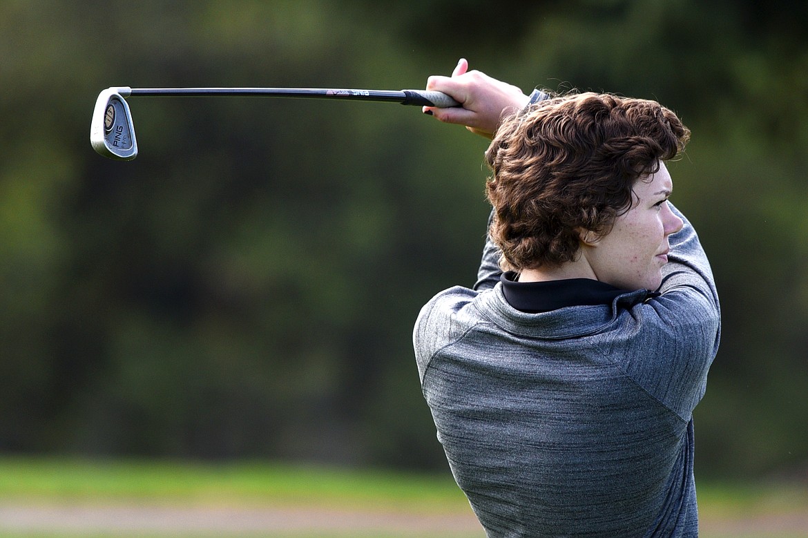 Bigfork's Carly Stodghill plays a shot from the fairway on the 3rd hole at Eagle Bend Golf Club on Tuesday. (Casey Kreider/Daily Inter Lake)