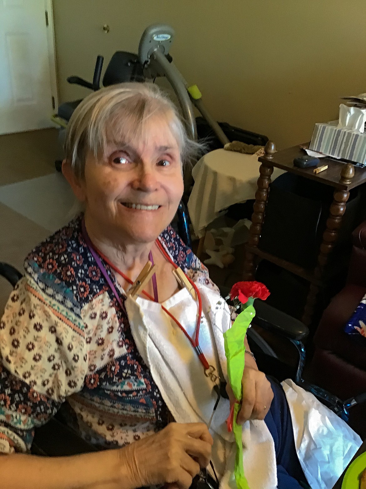 Courtesy photo 
 Gwen, a resident and mother at Avamere at Moses Lake assisted-living facility, holds her new Mother’s Day flowers and treats on Sunday.